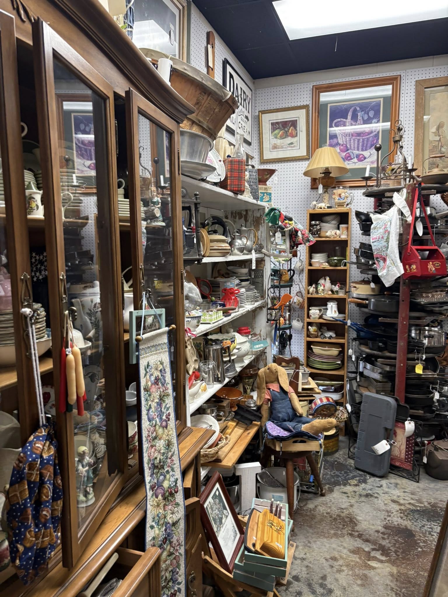 Glass display cases filled with vintage items inside Vintiques