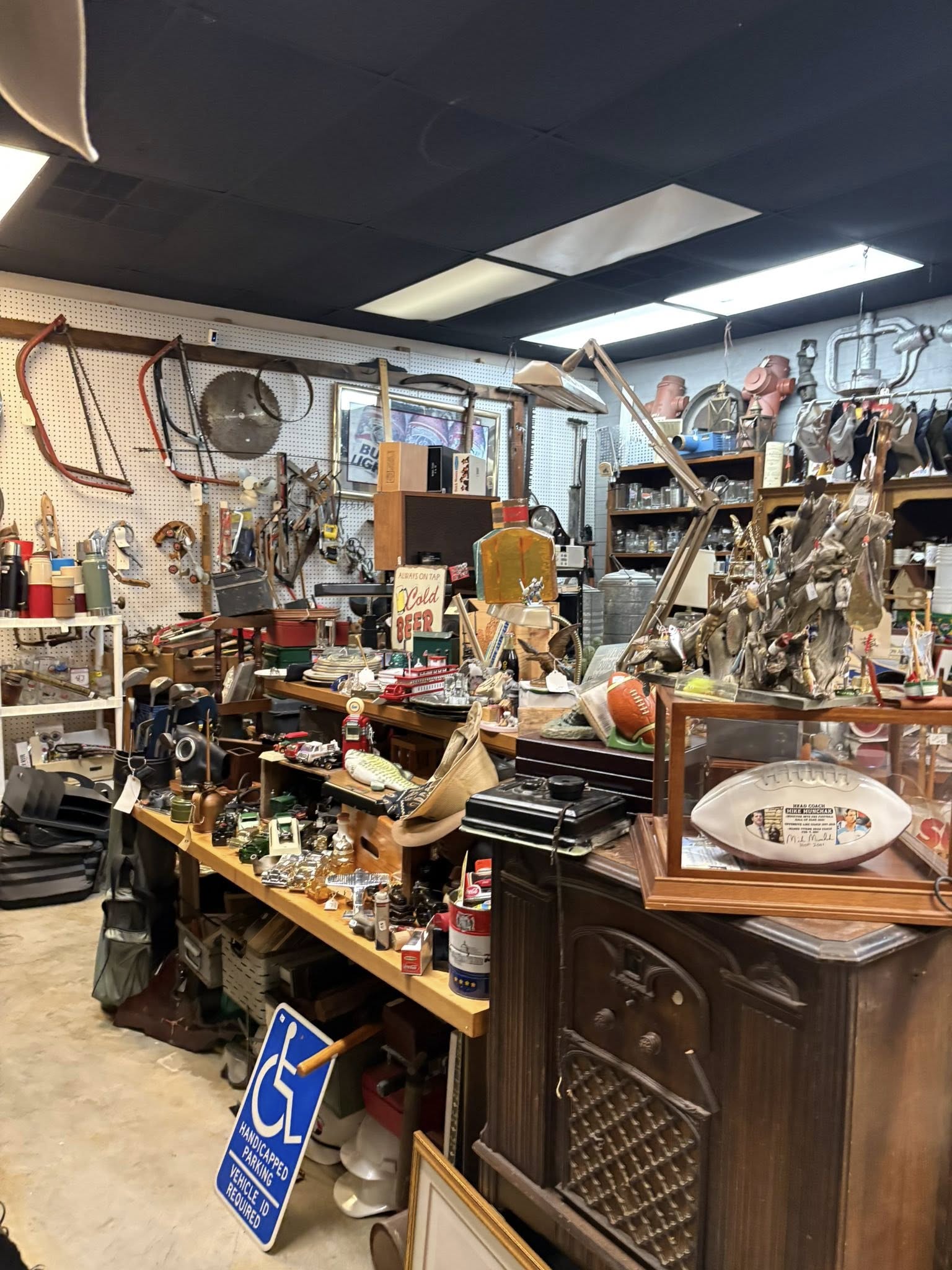 A room inside Vintiques filled with antique displays
